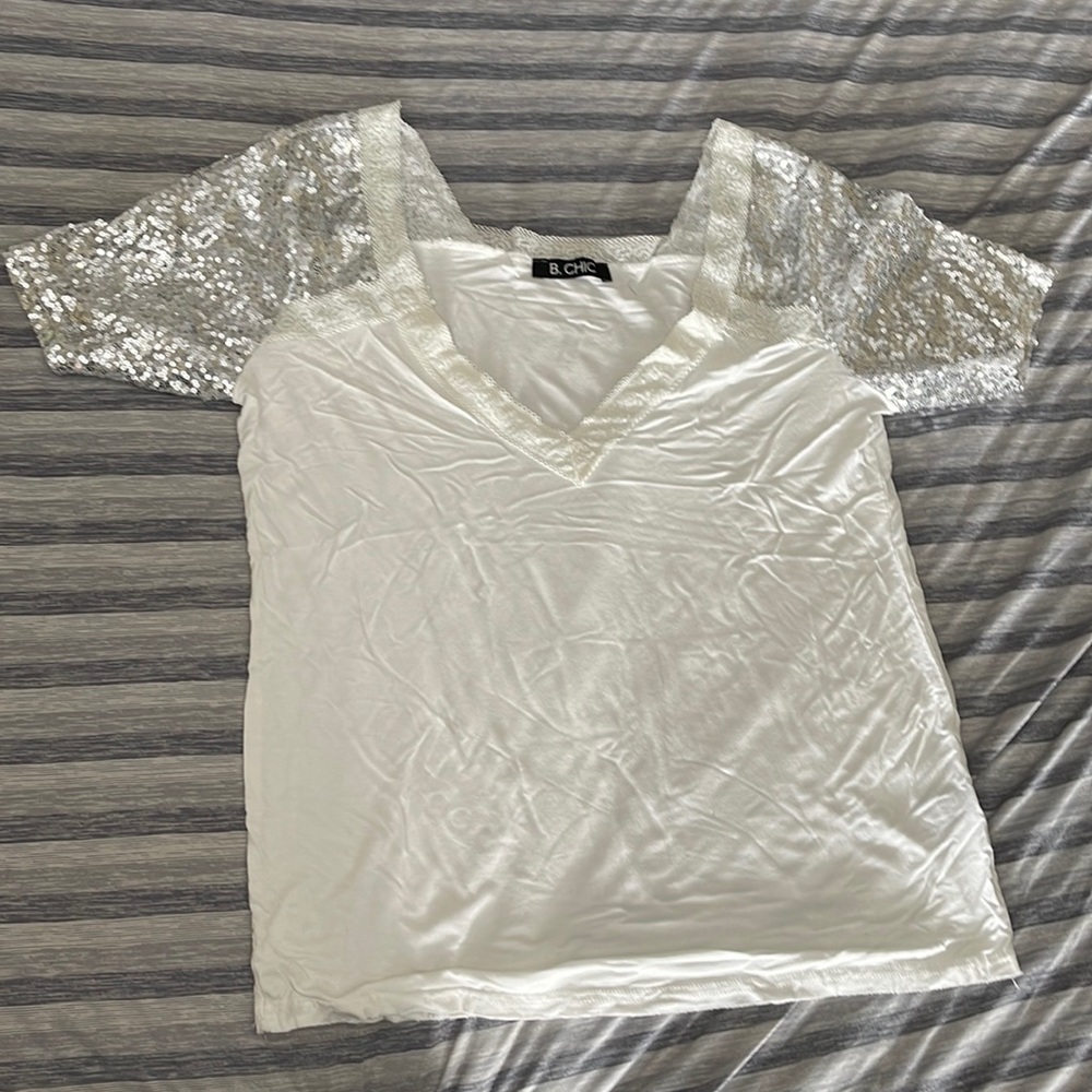 B.Chic top with sparkle sleeves-Size Medium